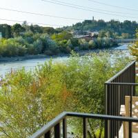 a view of a river from a balcony at Four Seasons Riverside, Kutaisi