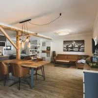 Modernes Loft vor den Toren des Chiemgaus, hótel í Tacherting