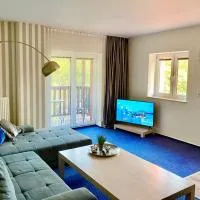 LAS SŁUPSKI PREMIUM APARTMENT A6 - - dwie sypialnie dwa podwójne łóżka - - salon z balkonem widok las aneks kuchenny - - WiFi Netflix Smart TV50 - - wysoka jakość za niską cenę - - zapraszamy, hotel u gradu 'Słupsk'