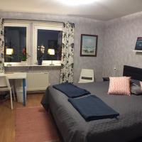 Dubbelrum med extrasäng på markplan i lugnt villaområde, hotel i Oster, Malmø