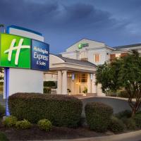 a sign in front of a hotel at Holiday Inn Express Hotel & Suites Auburn - University Area, an IHG Hotel