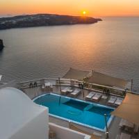 arial view of a pool on a cruise ship at sunset at Grand View - Megalochori Santorini