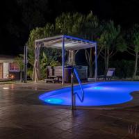 Bungalow espectacular garaje piscina y jacuzzi, hotel en Aljaraque