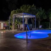 Bungalow espectacular garaje, piscina y jacuzzi, hotel en Aljaraque