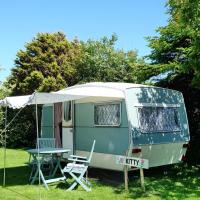 KItty unique 60s caravan set in pretty garden