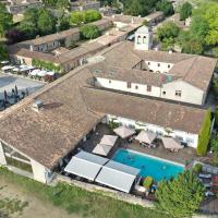 an aerial view of a house with a swimming pool at Logis Hôtel Restaurant La Citadelle, Blaye