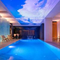 a swimming pool in a hotel with a sky ceiling at Time Boutique Hotel, Split