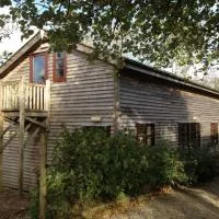 3-Bed Barn Eco-Lodge on the Tarka trail, хотел в Грейт Торингтън