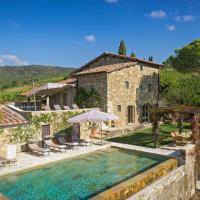 a house with a swimming pool in front of a building at Il Casetto, Radda in Chianti