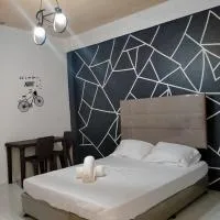 DJCI Apartelle Walk to Robinson & NE Pacific Mall 3 Min to SM Cabanatuan, hotel di Cabanatuan
