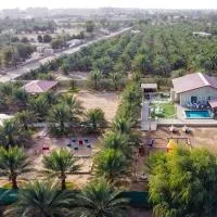 Al Reef Rest House, hotel i Al Khārī