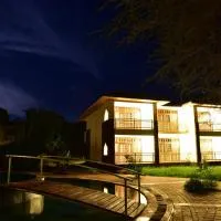 Hunters Lodge, hotel sa Twaandu