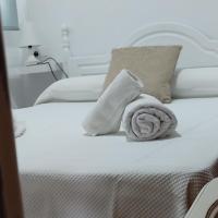 Apartamentos Bolonia - M a n u e l a
