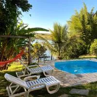 Casinha Branca De Varanda com piscina e fundo pra represa funil em Ijaci, hotel a Ijaci