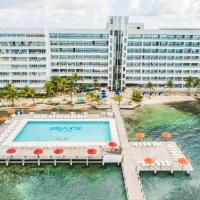 an aerial view of a hotel with a pool and a building at GHL Hotel Sunrise, San Andrés