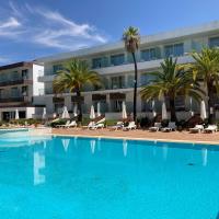 a large swimming pool in front of a hotel at Hotel Jerez & Spa, Jerez de la Frontera