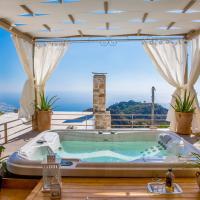 4 bedrooms house with sea view jacuzzi and enclosed garden at Anatoli、Anatolíのホテル