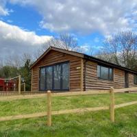 Log Cabin with View of the Malvern Hills