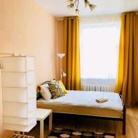 a small bedroom with a bed and a window at Hostel One Turku