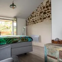 Moulin des Comtes - Chambre les Rochers, hotel en Viverols