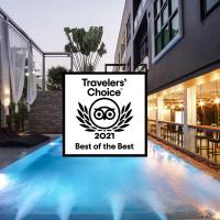 a sign that says travelers choice best of the best at a restaurant at ISTY Hotel -SHA Extra Plus, Chiang Mai
