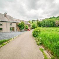 Beautiful home in L glise with a garden and pond