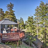 a house with a deck with an outdoor gazebo at Private Evergreen Hideaway with Deck and Mtn View