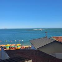 Apartamento quadra praia com vista mar