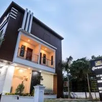 Thenmala Hormuz Inn, hotel u gradu Kolattupuzha