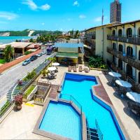 an aerial view of a hotel with a swimming pool at Rede Andrade Comfort, Natal
