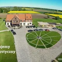 Folwark Żuławski، فندق في البلاج