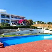 Stella Beach Hotel: Panormos Resmo şehrinde bir otel