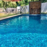 EXCELENTE CASA EN PRIVADA ALBERCA- GYM-JARDÍN- Asador، فندق بالقرب من Tamuín National Airport - TSL، سيوداد فاليس