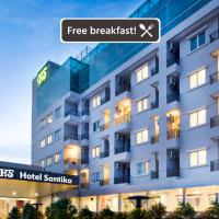 a rendering of a hotel building with the sign for free breakfast at Hotel Santika Mega City Bekasi
