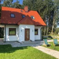 Caloroczny domek letniskowy ze stawem, хотел в Harsz