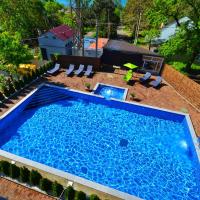 an overhead view of a swimming pool in a backyard at Loft, Dzhubga