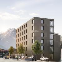 a rendering of a building with cars parked outside at ALPSTADT LIFESTYLE Hotel, Bludenz