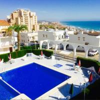 Apartment with pool, sea views & balcony less than 10min walk to La Mata Beach!