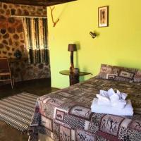 Charming Bush chalet 1 on this world renowned Eco site 40 minutes from Vic Falls Fully catered stay - 1975, hotel a Victoria Falls