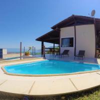 Vista espetacular, churrasqueira gourmet e piscina aquecida โรงแรมที่Piuvaในอิลญาเบลา
