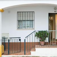 Awesome home in La Algaba with Outdoor swimming pool, WiFi and 3 Bedrooms