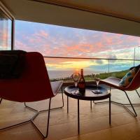 Sunset Waves Sea view apartment featuring panoramic views & parking