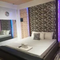 Viesnīca DJCI Apartelle Walk to Robinson & NE Pacific Mall 3 Min to SM Cabanatuan pilsētā Kabanatuana