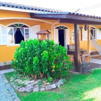 Ótima Casa para 10 pessoas /menos de 100m da Praia, hotel em Ponta das Canas, Florianópolis