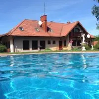 Pensjonat u Alexa, hotel di Załuski
