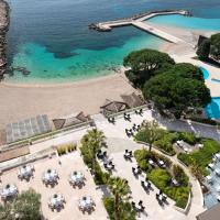 an aerial view of a resort with a beach and a pool at Le Méridien Beach Plaza, Monte Carlo