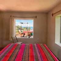 Richar’s home - experience Amantani with my family, hotel sa Amantani