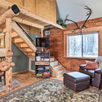 a living room with a staircase in a tiny house at Snowshoe Cabin with Gas Grill Fish and Hike!, Big Lake