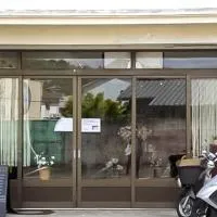 Guest Cafe Kuchikumano, hotel a Kamitondacho
