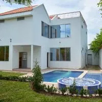 Casa vacacional Girardot 5 habit، فندق في جيراردو